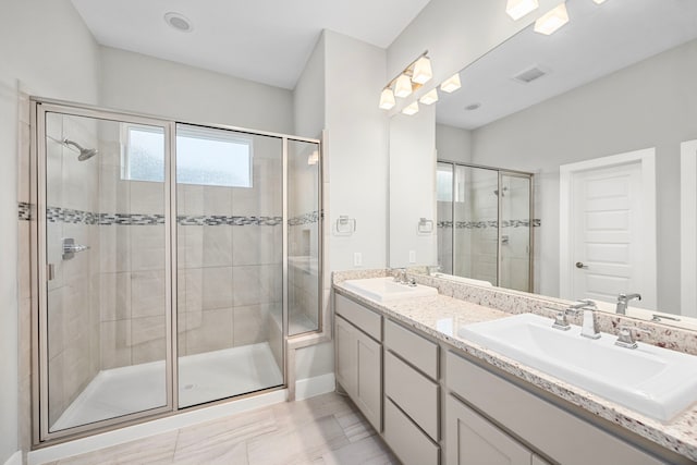 13207 Terania Cliff Trce, Houston, TX 77059 - bathroom featuring a shower stall and double vanity