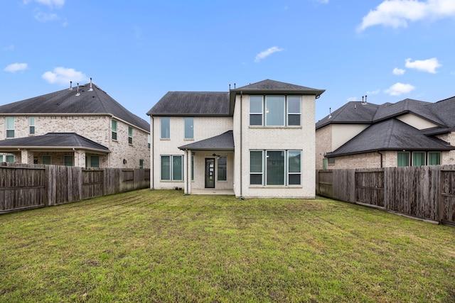 13207 Terania Cliff Trce, Houston, TX 77059 - back of house with a fenced backyard, a patio area, and stucco siding