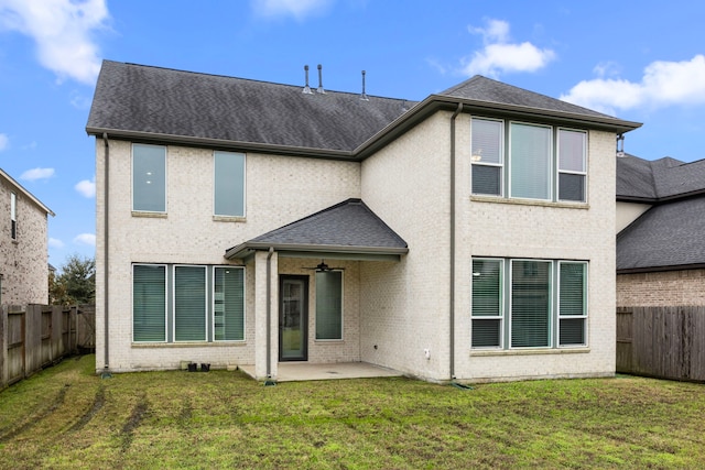 13207 Terania Cliff Trce, Houston, TX 77059 - back of property with a patio area, a fenced backyard, ceiling fan, brick siding, and a shingled roof