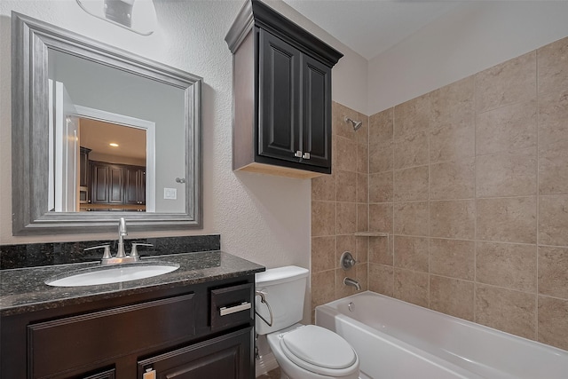 11607 Carisio Ct, Richmond, TX 77406 - bathroom featuring vanity,  shower combination, and a textured wall