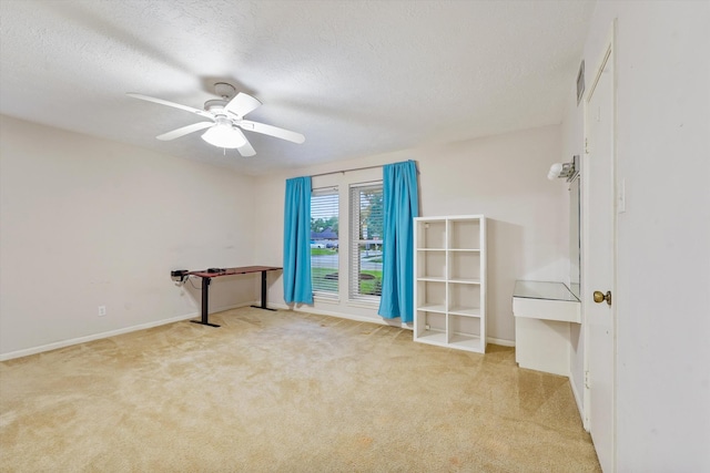 4790 Whispering Falls Dr, Houston, TX 77084 - spare room featuring light colored carpet, ceiling fan, and a textured ceiling
