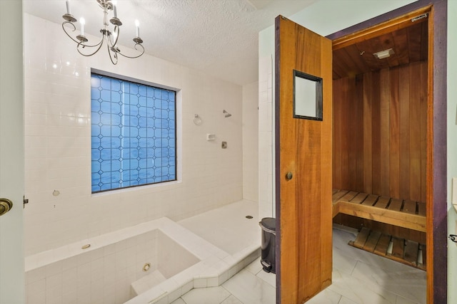 4790 Whispering Falls Dr, Houston, TX 77084 - full bathroom with a relaxing sauna, a chandelier, a whirlpool tub, a textured ceiling, and a shower