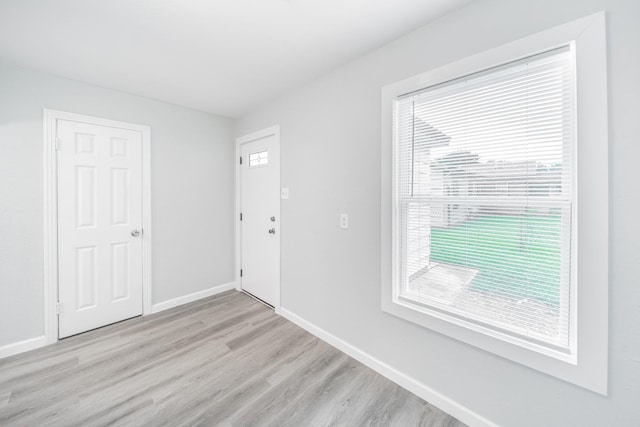 6307 Westover St, Houston, TX 77087 - empty room featuring light wood-style floors and plenty of natural light