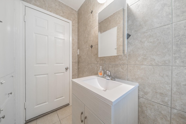 6307 Westover St, Houston, TX 77087 - bathroom featuring tile walls, vanity, and tile patterned flooring