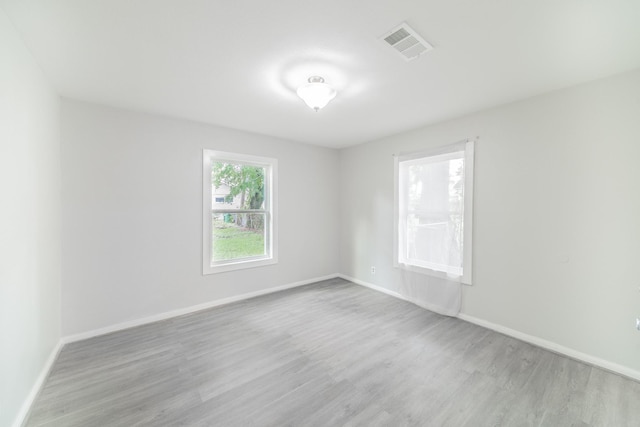 6307 Westover St, Houston, TX 77087 - spare room featuring wood finished floors and baseboards