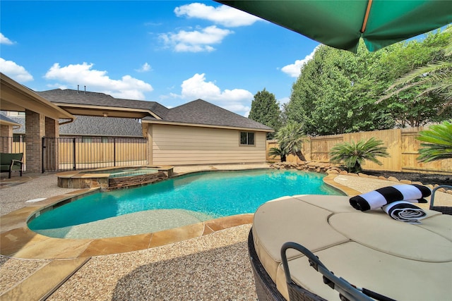 5714 Spring River Ln, Fulshear, TX 77441 - view of swimming pool with a pool with connected hot tub, a fenced backyard, and a patio