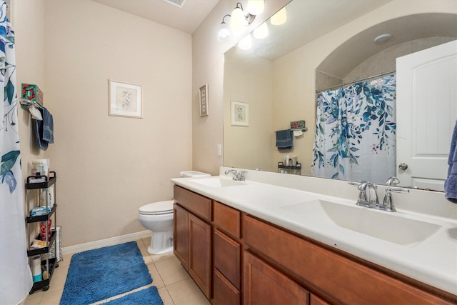 22911 Banff Brook Way, Tomball, TX 77375 - full bathroom with double vanity, tile patterned floors, and curtained shower