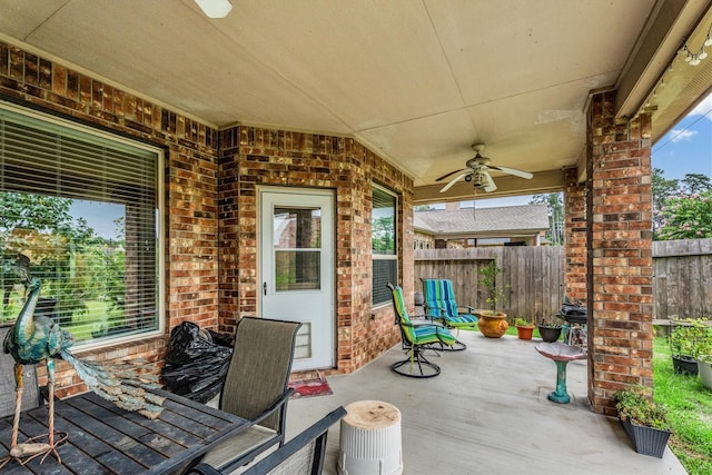 22911 Banff Brook Way, Tomball, TX 77375 - view of patio featuring ceiling fan and outdoor dining space
