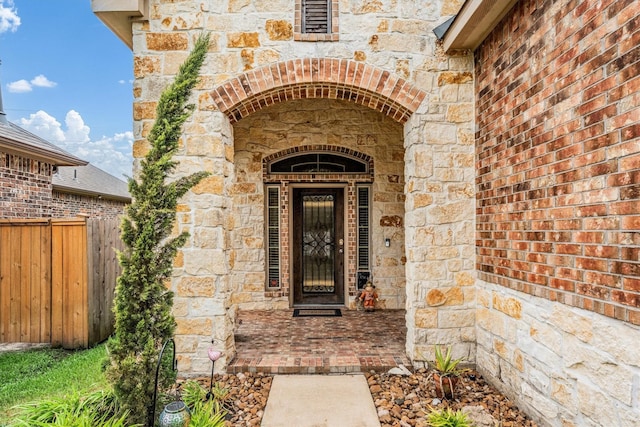 22911 Banff Brook Way, Tomball, TX 77375 - view of exterior entry featuring stone siding