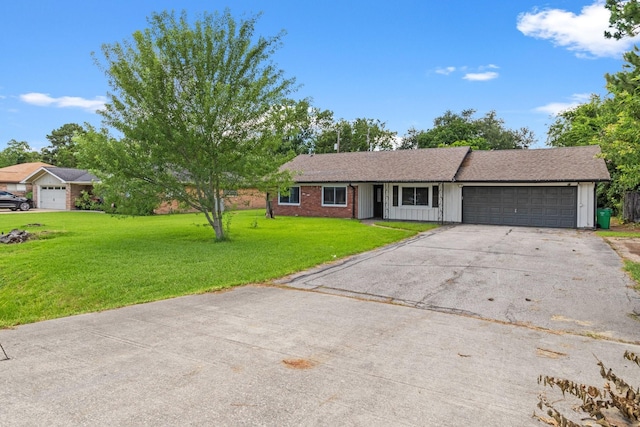 109 Timber Ln, Baytown, TX 77520 - single story home with a garage, asphalt driveway, and a front lawn
