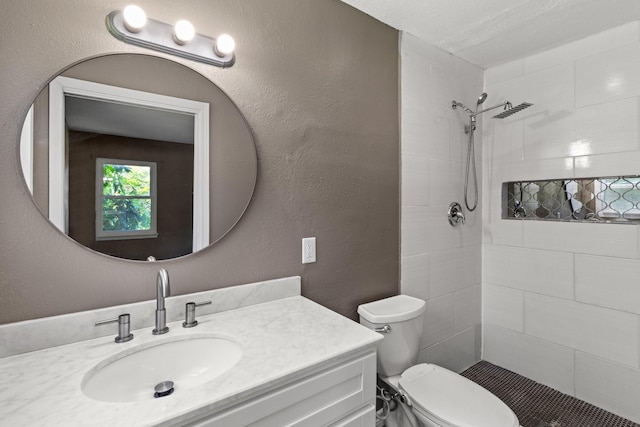 109 Timber Ln, Baytown, TX 77520 - bathroom featuring a tile shower and vanity