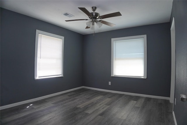 6803 6th St, Hitchcock, TX 77563 - empty room with dark wood-style flooring and ceiling fan