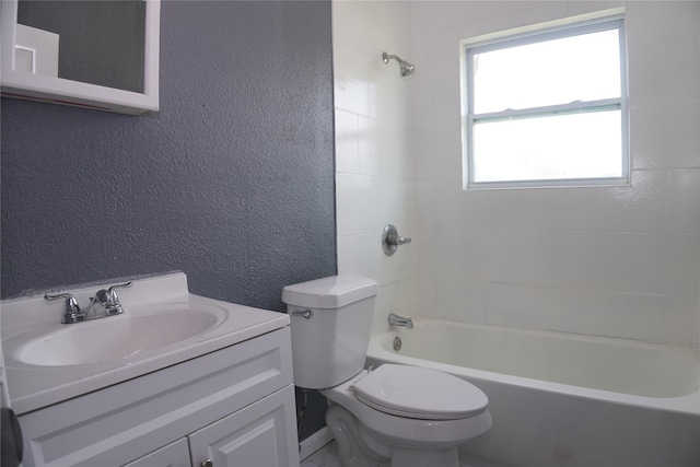 6803 6th St, Hitchcock, TX 77563 - full bathroom featuring a textured wall, vanity, and shower / bath combination