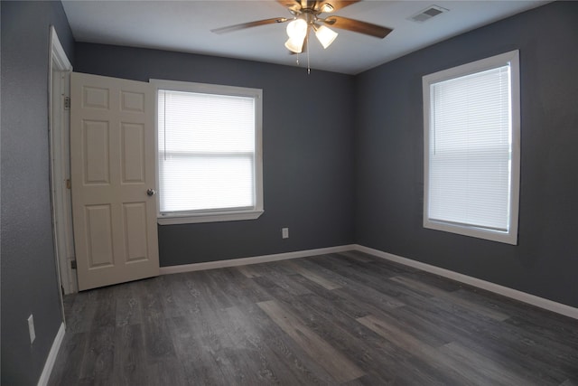 6803 6th St, Hitchcock, TX 77563 - unfurnished room with a ceiling fan and dark wood-style floors