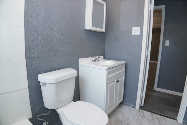 6803 6th St, Hitchcock, TX 77563 - bathroom featuring vanity and a textured wall