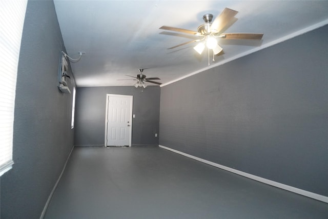 6803 6th St, Hitchcock, TX 77563 - spare room featuring a ceiling fan and concrete floors