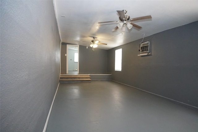 6803 6th St, Hitchcock, TX 77563 - spare room featuring concrete flooring, ceiling fan, and a textured wall