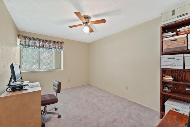 11815 Sharpview Dr, Houston, TX 77072 - home office featuring ceiling fan, carpet, and a textured ceiling