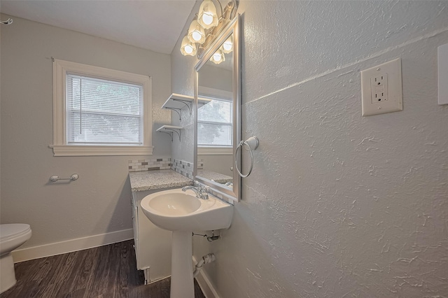 1813 Hatwell St, Houston, TX 77023 - bathroom with wood finished floors and healthy amount of natural light