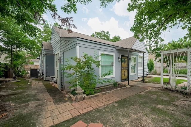 1813 Hatwell St, Houston, TX 77023 - view of front of property featuring roof with shingles and a patio