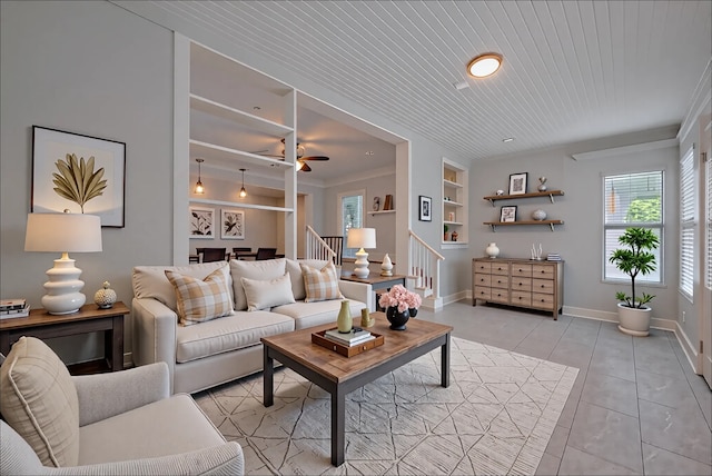 1813 Hatwell St, Houston, TX 77023 - living area with built in shelves, stairway, a ceiling fan, wooden ceiling, and light tile patterned floors