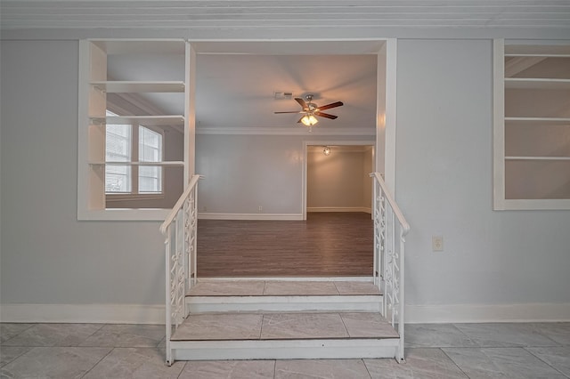 1813 Hatwell St, Houston, TX 77023 - staircase featuring a ceiling fan and crown molding