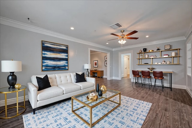 1813 Hatwell St, Houston, TX 77023 - living area featuring dark wood-type flooring, ceiling fan, ornamental molding, and recessed lighting