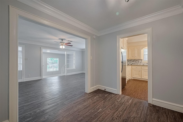 1813 Hatwell St, Houston, TX 77023 - spare room with dark wood-style floors, ornamental molding, and ceiling fan