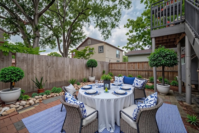 1813 Hatwell St, Houston, TX 77023 - wooden deck with a patio area, a fenced backyard, and outdoor dining space