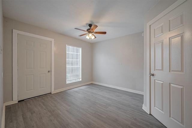1813 Hatwell St, Houston, TX 77023 - unfurnished room featuring ceiling fan and wood finished floors