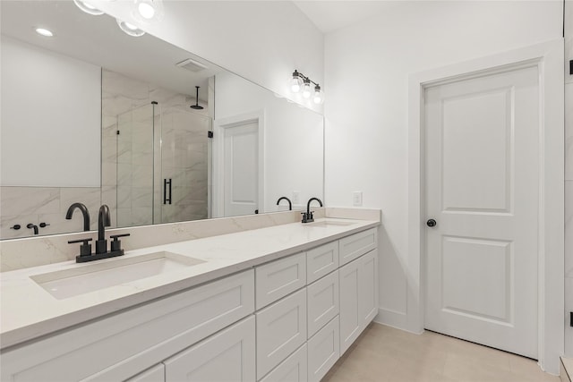 7410 Hezekiah Ln, Houston, TX 77088 - bathroom featuring a shower stall and double vanity