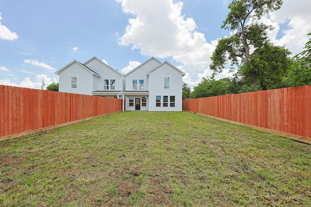 7410 Hezekiah Ln, Houston, TX 77088 - rear view of house featuring a fenced backyard