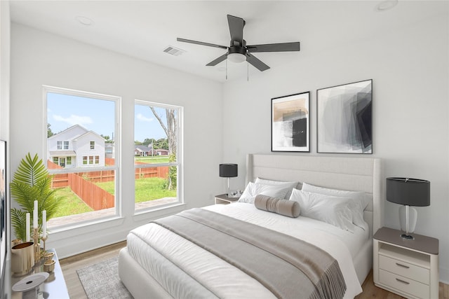 7410 Hezekiah Ln, Houston, TX 77088 - bedroom with wood finished floors and ceiling fan