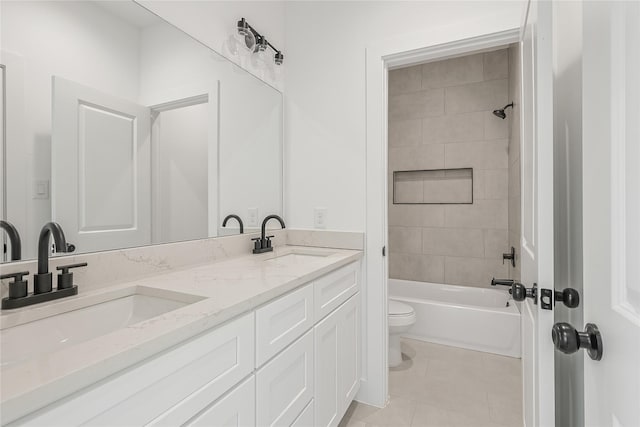 7410 Hezekiah Ln, Houston, TX 77088 - full bathroom featuring double vanity, tile patterned floors, and tub / shower combination