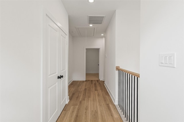 7410 Hezekiah Ln, Houston, TX 77088 - corridor with attic access, light wood finished floors, and recessed lighting