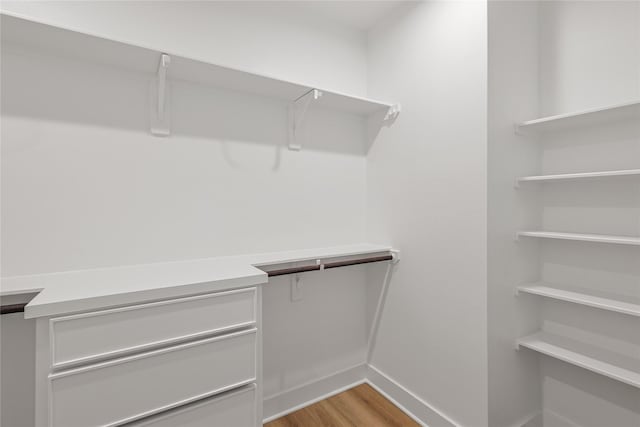 7410 Hezekiah Ln, Houston, TX 77088 - spacious closet featuring light wood-style floors