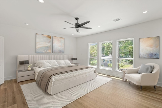 7410 Hezekiah Ln, Houston, TX 77088 - bedroom featuring recessed lighting, light wood-style floors, and ceiling fan