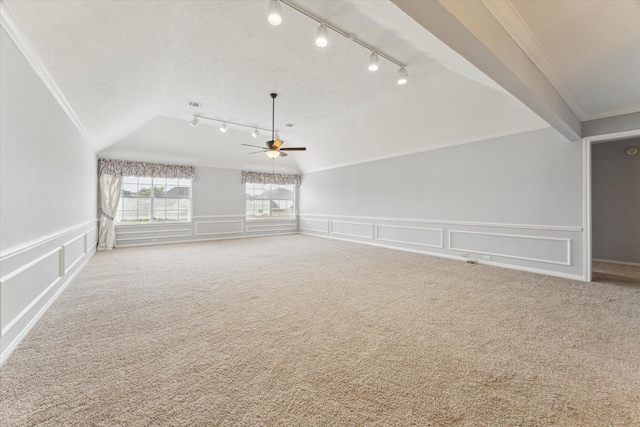 2125 Tipperary Dr, Pearland, TX 77581 - bonus room featuring a decorative wall, carpet floors, ceiling fan, and a wainscoted wall