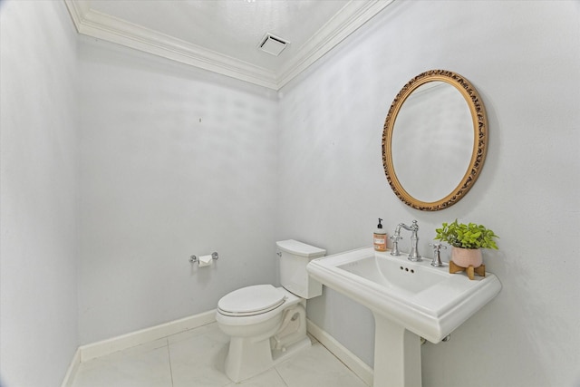 2125 Tipperary Dr, Pearland, TX 77581 - half bathroom featuring ornamental molding and tile patterned flooring