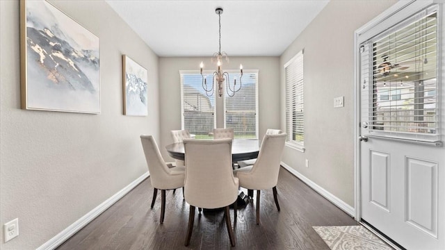 14926 Kenton Place Ln, Cypress, TX 77429 - dining area featuring a chandelier and dark wood-type flooring