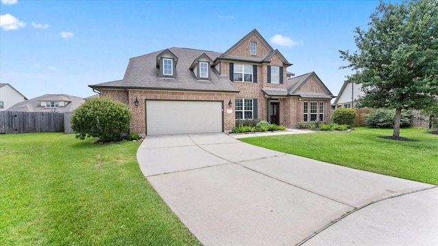14926 Kenton Place Ln, Cypress, TX 77429 - view of front of property with driveway, brick siding, and a garage