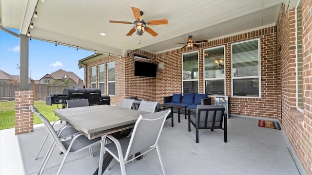 14926 Kenton Place Ln, Cypress, TX 77429 - view of patio / terrace with an outdoor living space, a ceiling fan, and outdoor dining space