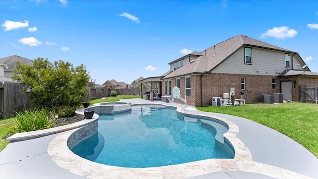 14926 Kenton Place Ln, Cypress, TX 77429 - view of pool with a fenced backyard, a patio area, and a pool with connected hot tub