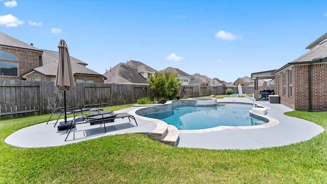 14926 Kenton Place Ln, Cypress, TX 77429 - view of swimming pool featuring a residential view, a fenced backyard, a patio, and a pool with connected hot tub