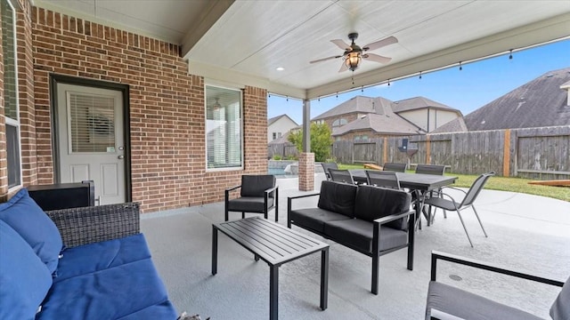14926 Kenton Place Ln, Cypress, TX 77429 - fenced backyard featuring outdoor lounge area, a patio area, and outdoor dining space