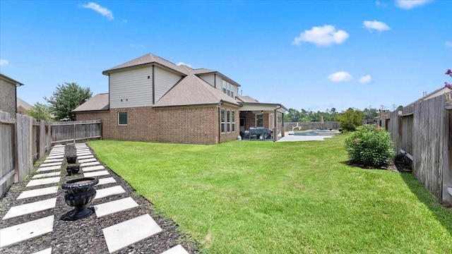 14926 Kenton Place Ln, Cypress, TX 77429 - fenced backyard with a patio area