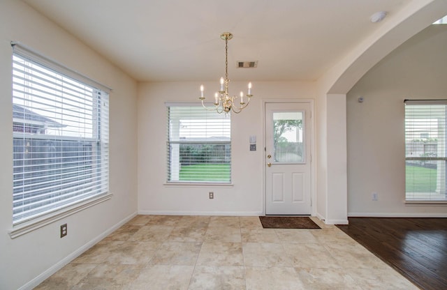 11610 Cross Spring Dr, Pearland, TX 77584 - entrance foyer featuring a chandelier and arched walkways