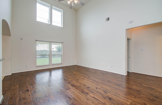 11610 Cross Spring Dr, Pearland, TX 77584 - unfurnished room featuring high vaulted ceiling, a ceiling fan, plenty of natural light, hardwood / wood-style floors, and arched walkways