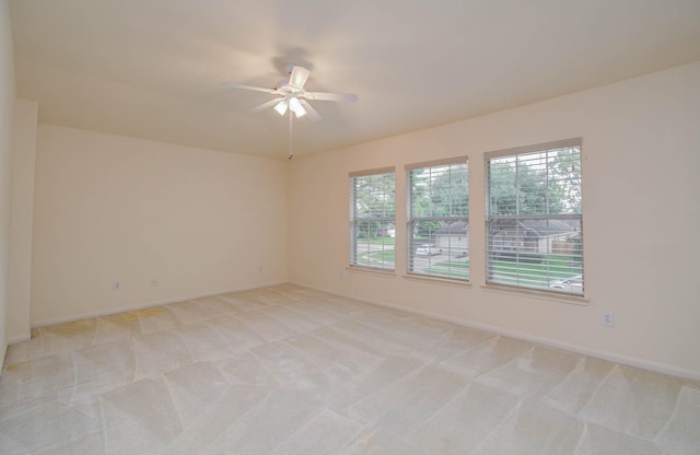 11610 Cross Spring Dr, Pearland, TX 77584 - spare room with a ceiling fan and light carpet
