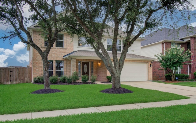 11610 Cross Spring Dr, Pearland, TX 77584 - traditional home featuring driveway, a garage, brick siding, and a gate